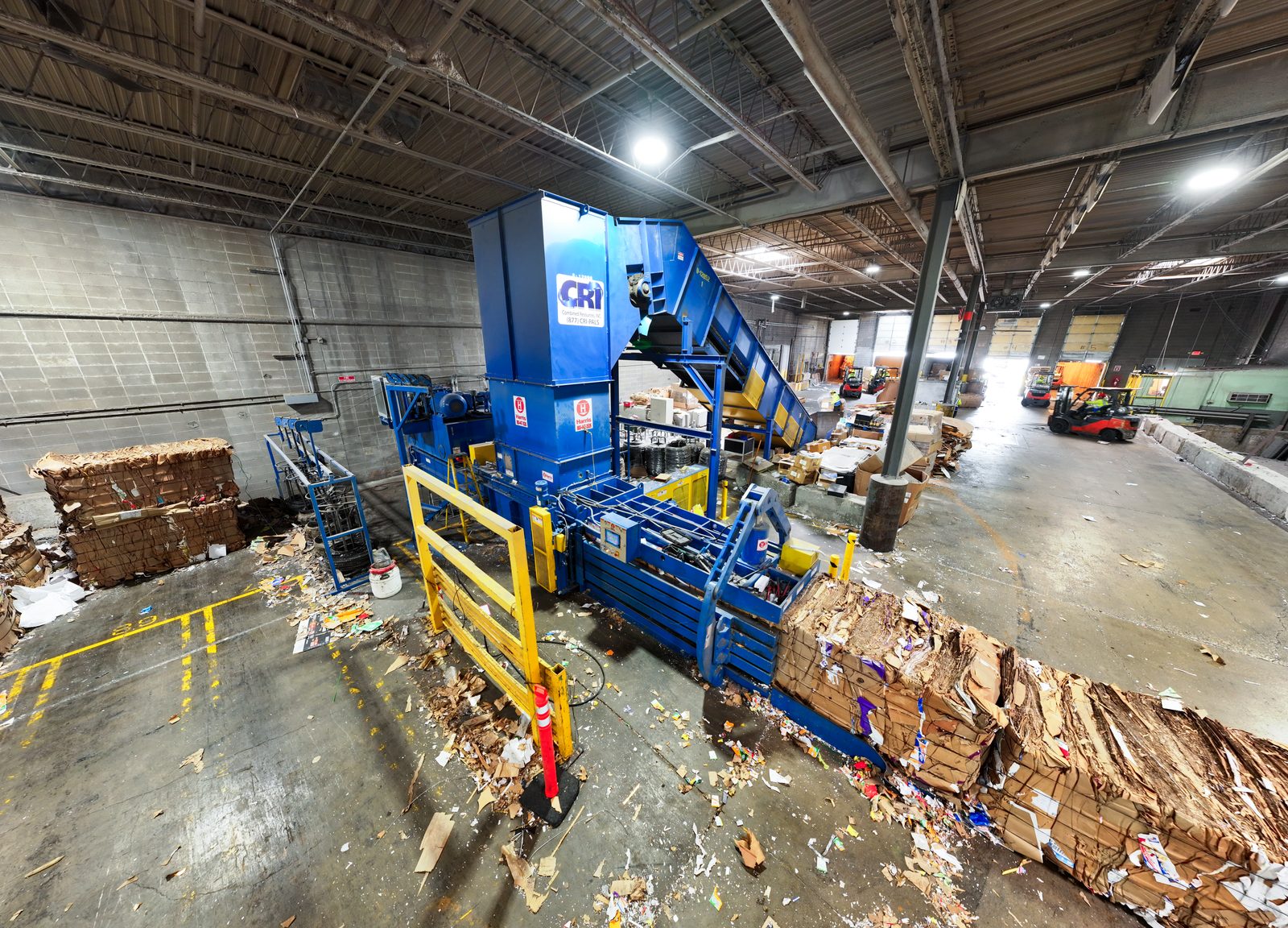 CRI industrial baler processing corrugated cardboard